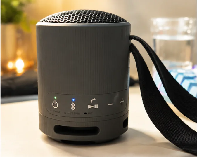My Sony SRS-XB100 showing the power, Bluetooth, play, volume, and mic controls