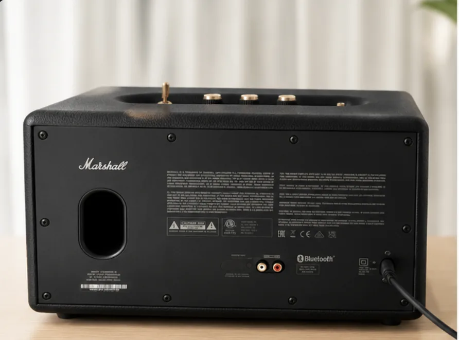 Rear view of my Marshall Stanmore III showing the power cable connection, RCA inputs, and bass reflex port